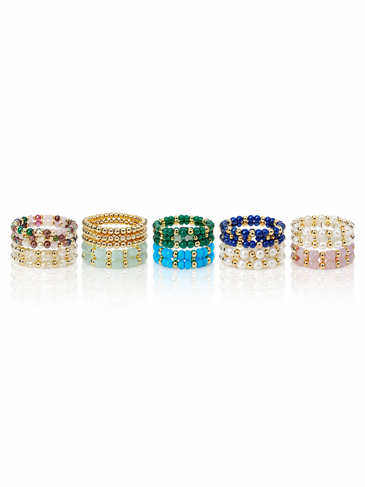 GEMSTONE AND GOLD BALL STRETCH RING