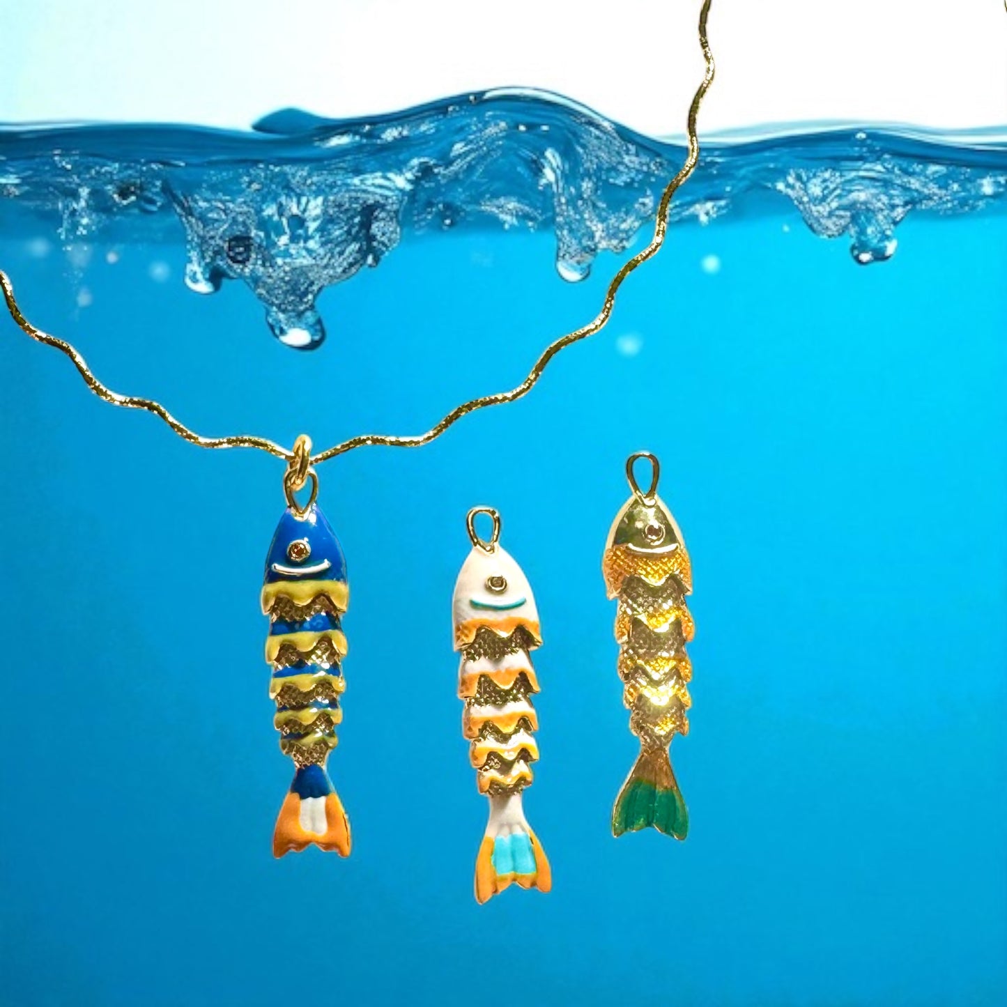 ARTICULATED FISH AND SHELL ON GOLD VERMEIL WAVY NECKLACE