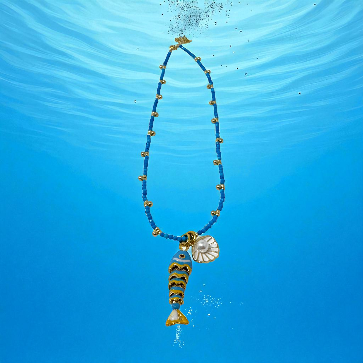 ARTICULATED FISH ON GEMSTONE BEADED NECKLACE